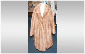 Blonde Mink Three Quarter Length Coat, fully lined. Collar with revers, hook & loop fastenings. slit