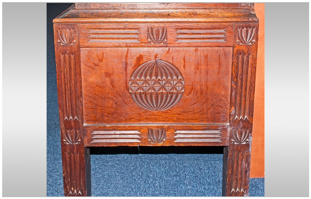 A Rare Aesthetic Movement Highly Carved Cabinet Cupboard In Oak. The top has three leaded top - Image 4 of 8