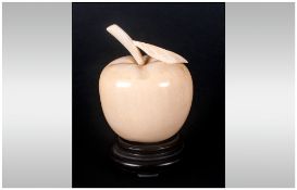 Japanese carved Ivory apple with wooden base. Early 20th century.