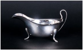 A Silver Sauce Boat of Plain Form, Raised on 3 Splayed Feet. Maker E. Viner,, Hallmark Sheffield