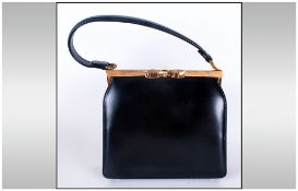 A Vintage 1950's Lodix Black Leather Handbag with Original Purse and Mirror. Also Suede and