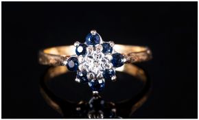 18ct Gold Cluster Ring, Flowerhead Setting With Central Round Cut Diamond Surrounded By 8 Round