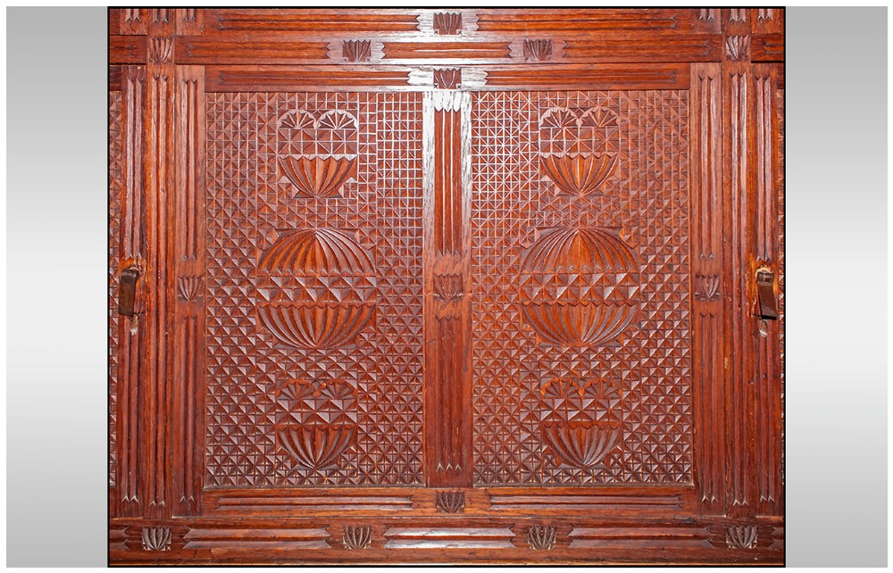 A Rare Aesthetic Movement Highly Carved Cabinet Cupboard In Oak. The top has three leaded top - Image 7 of 8
