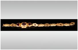 19th Century Gem Set Bracelet Three Central Garnets, Embossed Hollow Links. Appears Gold. Damage