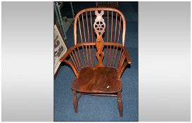 18th/19thC Windsor Chair spindled back with cartwheel splat. Height 34 inches.