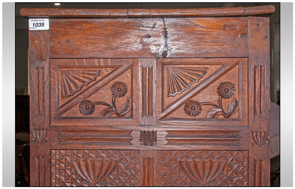 A Rare Aesthetic Movement Highly Carved Cabinet Cupboard In Oak. The top has three leaded top - Image 3 of 8