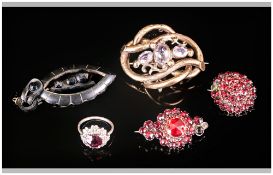 Small Collection of Victorian Jewellery comprising two red garnet brooches and ring similar,