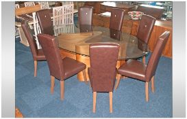 Contemporary Design Table & Eight Chairs, Large Oval Glass Topped Dining Table Raised On A