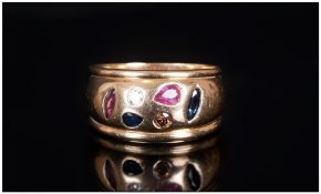 Ladies 18ct Gold Dress Ring Rub Over Setting With Two Sapphires, Rubies And Diamonds, Stamped 750,