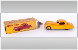 Dinky Toys Diecast Model Car 157. 'Jaguar XK120 Coupe' Circa 1950. Yellow colourway. Complete with