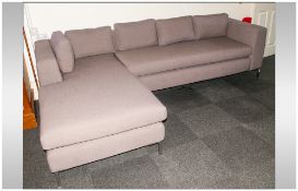 Large Angled & Sectional Modern Style Upholstered Settee of square form. With Loose cushions to