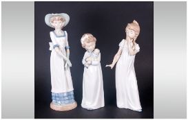 Nao by Lladro Figures ( 3 ) In Total. 1/ Elegant Young Lady, Stands 12..5 Inches High. 2/ Young Lady