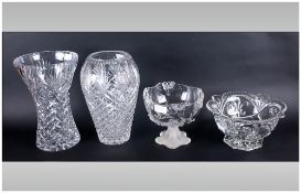 Four Pieces of Crystal Glass Ware comprising two fleur de lys style bowls, and two tall vases 11