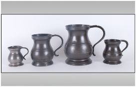 Four Antique Pewter Bulbous Shaped Tankards From A Quarter Size To A Gill.