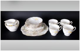 Melba Bone China Part Tea Set comprising cups, saucers, side plates, milk jugs, sugar bowl. 20