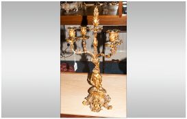 Antique French Ormalu Candleabra In The Rococo Style, With a Central figure of a young girl