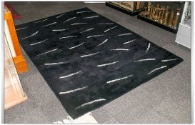 Contemporary Designed Black Wool Carpet Of Good Heavy Quality. With a black & white abstract design.