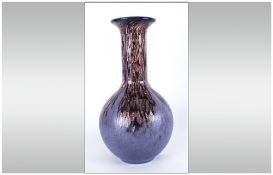 Striking Copper On Oxide Glass Vase 14 inches high.