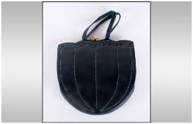 A 1950's British Made Ladies Black Leather Fashion Bag & Purse with fitted interior. 7'' in