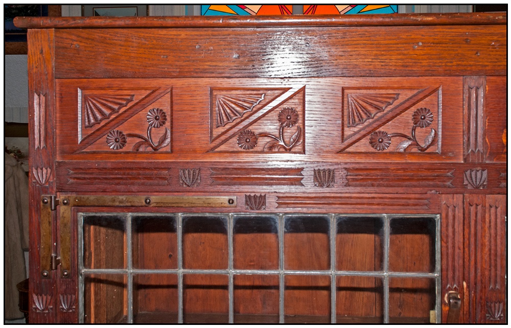 A Rare Aesthetic Movement Highly Carved Cabinet Cupboard In Oak. The top has three leaded top - Image 6 of 8