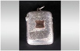 Victorian Silver Vesta Case with 9ct gold shield shaped cartouche. Hallmark Birmingham 1899. 2''