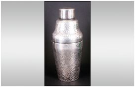 Art deco Silvered Metal Cocktail Shaker with a planished beaten body, impressed mark to base. NR.