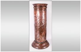 Persian Arabic Antique Copper Embossed Stick Stand, profusely embossed to the body with winged