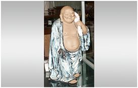 Chinese Celadon Glazed Stoneware Figure Of A Standing Buddah Carrying A White Sack on His Shoulder &