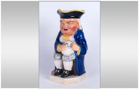 Antique Burlington Ware Hand Painted Toby Jug, titled 'Boozes; 9.25 inches high.