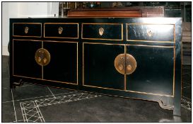 Chinese Black Lacquered Credenza Cabinet of two cupboard configuration below four drawers. With