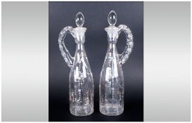 French Mid 19th Century Pair of Decorative Glass. Claret jugs, 1850s. Height 12.25 inches