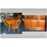 Ercol Elm/Beach Dining Room Table And 4 Chairs Together With A Matching Sideboard