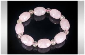 Rose Quartz and Prehnite Bracelet, faceted ovoid beads of rose quartz interspaced with small round