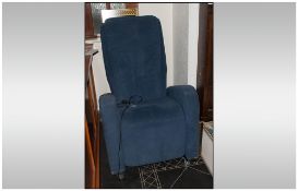 Keyton Reclining Massage Chair, Upholstered in blue fabric. On Castors.