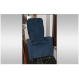 Keyton Reclining Massage Chair, Upholstered in blue fabric. On Castors.