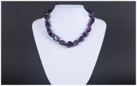 Amethyst Smooth Tumbled Bead Necklace, rich purple baroque amethysts, hand knotted onto purple silk,