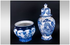 Blue & White Masons Ironstone Lidded Vase together with a blue & white Wedgwood Planter.