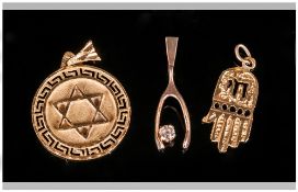 High ct Gold Charms, 3 in total. Includes Wishbone set with diamonds plus two others.