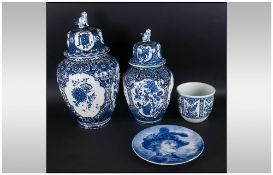 Four Pieces of Blue and White Delftware comprising large bulbous lidded vase in the Chinese style,