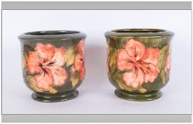 Moorcroft Pair Of Small Planters, 'Coral Hibiscus' Design On Green Ground, Signed to base.