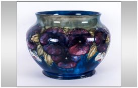 William Moorcroft Signed - Large and Impressive Jardiniere ' Pansy ' Design on Blue/Green Ground. c.