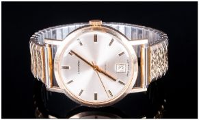 Garrards 9ct Gold Automatic Date Just Wristwatch fitted to a gold plated expanding bracelet.