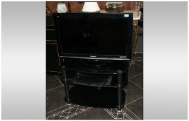 A Modern LCD Panasonic TV, TX/L32X10BA. With Stand.