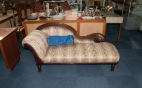 Victorian Style Chaise Lounge with shaped back and stained Beech Frame with an over stuffed rolling