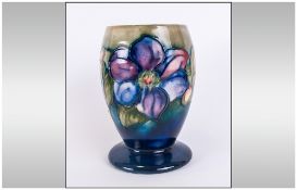 Moorcroft 'Clematis' Pattern Ovoid Vase with spread foot,