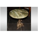 Onyx Top Coffee Table with a French gilded brass base. In the Ecclesiastical style.