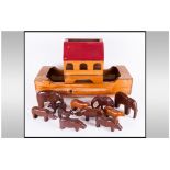 A Vintage Handmade Wooden Model Of Noahs Ark, complete with 10 hand carved animal figures.