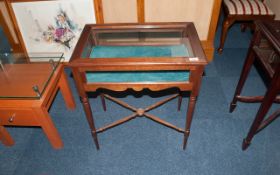 Mahogany Display Curio Cabinet, with glazed edge top, supported on turned legs. With bucket feet.