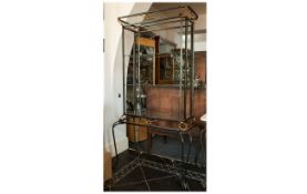 Wrought Iron Contemporary Display Stand with three exposed glass shelves support with wrought iron