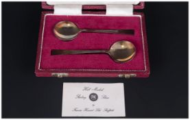 Two Silver Preserve Spoons Hallmarked For Francis Howard 1945, Complete In Fitted Silk Lined Case.